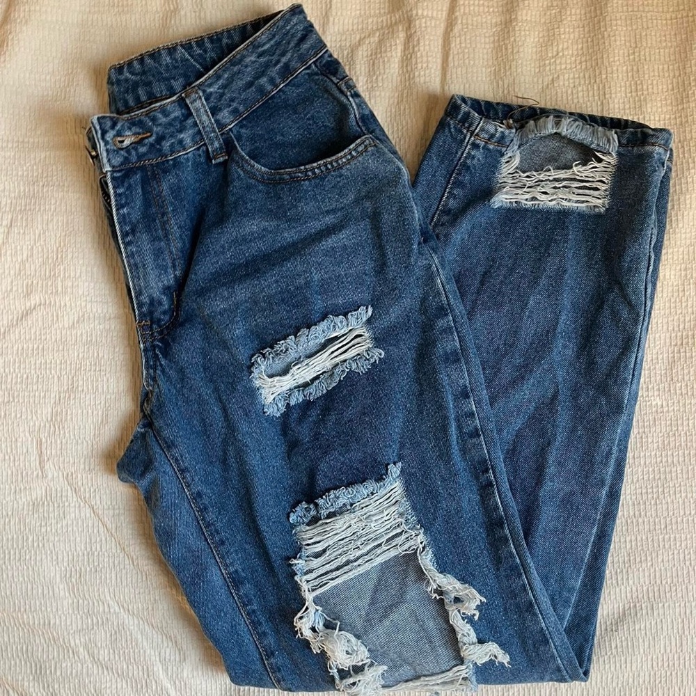 Distressed Blue Denim Jeans
